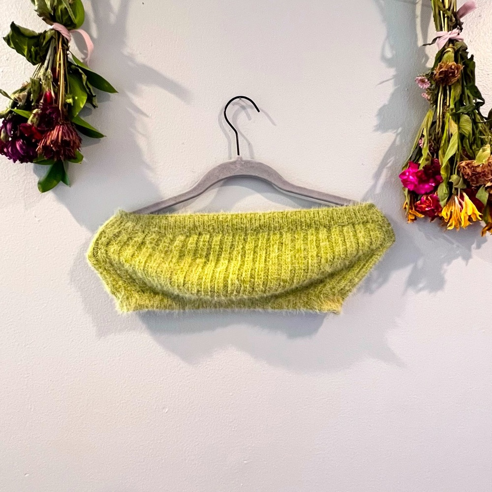Tube top. Worn a few times. Must be hand washed.